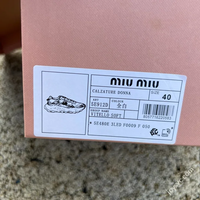 MIU MIU Embossed Logo Low Top Women's White Sneakers